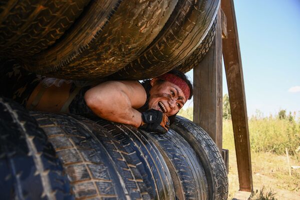 مشاركية في مسابقة اللعبة العسكرية سباق الأبطال، 11 يوليو 2020 - سبوتنيك عربي