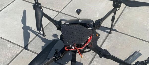 طائرة مسيرة محملة بمقذوف فوق بناية بمنطقة وسط العاصمة بغداد طائرة مسيرة محملة بمقذوف فوق بناية بمنطقة وسط العاصمة بغداد - سبوتنيك عربي