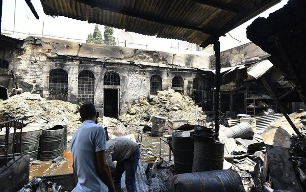 حريق سوق البزورية في العاصمة السورية دمشق  - سبوتنيك عربي