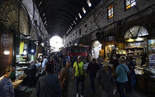 حريق سوق البزورية في العاصمة السورية دمشق  - سبوتنيك عربي