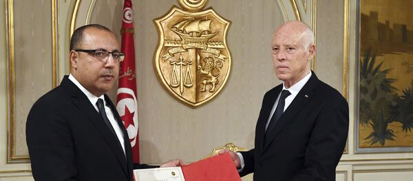  رئيس الحكومة التونسية المكلف هشام المشيشي خلال لقائه رئيس الجمهورية قيس سعيد - سبوتنيك عربي