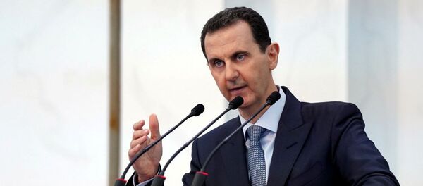 الرئيس السوري بشار الأسد في كلمة أمام أعضاء مجلس الشعب في القصر الرئاسي - سبوتنيك عربي