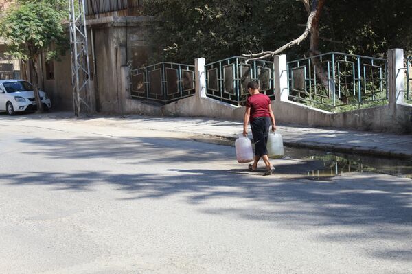في زمن كورونا... مليون سوري بلا ماء و كهرباء... والحل: نقطة روسية... فيديو وصور في زمن كورونا... مليون سوري بلا ماء و كهرباء... والحل: نقطة روسية... فيديو وصور - سبوتنيك عربي