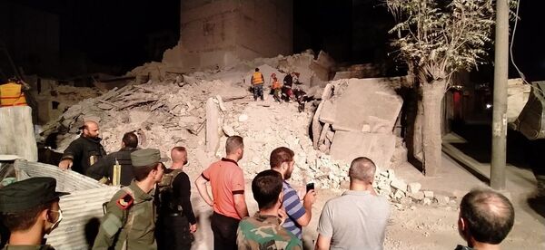 وفاة امرأة وإصابة زوجها بانهيار بناء في حلب شمالي سوريا - سبوتنيك عربي