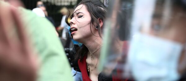 احتجاجات ضد الاجراءات المشددة التي فرضة السلطات الألمانية بسبب فيروس كورونا (كوفيد - 19) في برلين، ألمانيا 29 أغسطس 2020 - سبوتنيك عربي