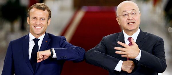 الرئيس العراقي برهم صالح والرئيس الفرنسي إيمانويل ماكرون - سبوتنيك عربي