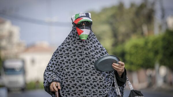 فرض الحجر الصحي بسبب موجة ثانية من تفشي فيروس كورونا في قطاع غزة، فلطسين - سبوتنيك عربي