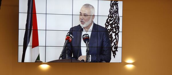  رئيس المكتب السياسي لحركة حماسإسماعيل هنية خلال مشاركته عبر الإنترنت في اجتماع الفصائل الفلسطينية حول اتفاق السلام بين الإمارات وإسرائيل، في رام الله، الضفة الغربية، فلسطين 3 سبتمبر 2020 - سبوتنيك عربي