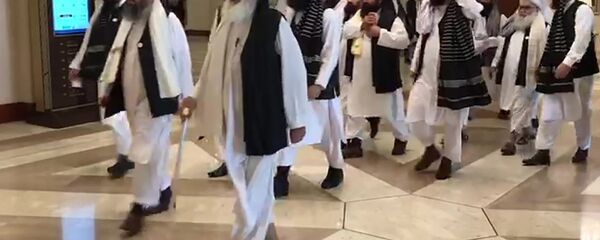 الجلسة الافتتاحية لمفاوضات السلام بين الحكومة الأفغانية وحركة طالبان، المنعقدة في الدوحة، قطر 12سبتمبر 2020 - سبوتنيك عربي