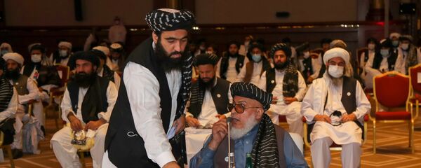 الجلسة الافتتاحية لمفاوضات السلام بين الحكومة الأفغانية وحركة طالبان، المنعقدة في الدوحة، قطر 12سبتمبر 2020 - سبوتنيك عربي