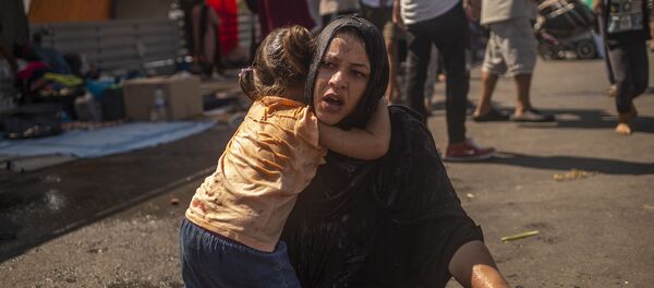 الوضع في مخيم موريا للاجئين والمهارجرين في جزيرة ليسبوس، اليونان 14سبتمبر 2020 - سبوتنيك عربي