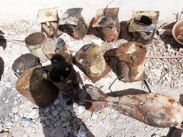 خبراء عراقيون وفرنسيون يرفعون قذائف جهنم من الفرات..صور - سبوتنيك عربي