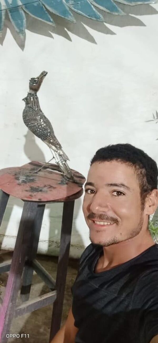 فنان مصري يشكل ميغ 21 وتمثال كليوباترا والقط باستيت من الخردة..صور وفيديو - سبوتنيك عربي