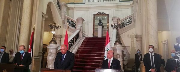 وزير الخارجية المصري سامح شكري خلال مؤتمر صحفي بالقاهرة مع وزير خارجية الأردن ‎أيمن الصفدي ووزير خارجية العراق ‎فؤاد حسين - سبوتنيك عربي