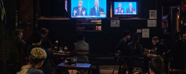 المنظارة الانتخابية بين المرشح الجمهوري الرئيس الحالي دونالد ترامب والمرشح الديمقراطي جو بايدن، الانتخابات الرئاسية، الولايات المتحدة الأمريكية 22 أكتوبر 2020 - سبوتنيك عربي