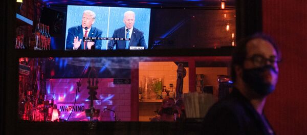 المنظارة الانتخابية بين المرشح الجمهوري الرئيس الحالي دونالد ترامب والمرشح الديمقراطي جو بايدن، الانتخابات الرئاسية، الولايات المتحدة الأمريكية 22 أكتوبر 2020 - سبوتنيك عربي