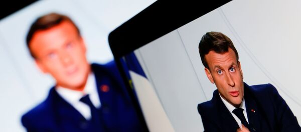  الرئيس الفرنسي إيمانويل ماكرون أثناء إلقاء كلمة للشعب الفرنسي حول الوضع الوباء (كورونا) في فرنسا، 28 أكتوبر 2020 - سبوتنيك عربي