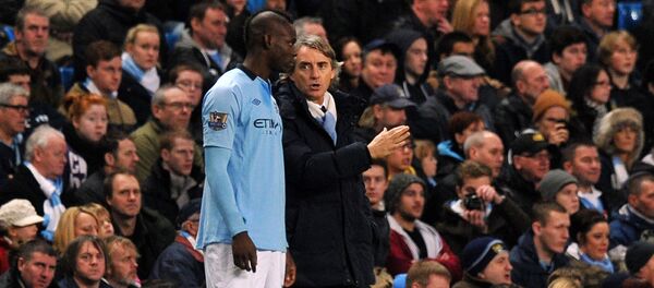 روبيرتو مانشيني وماريو بالوتيلي - سبوتنيك عربي