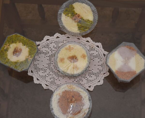   رغم كورونا عصيدة الزقوقو تجمع التونسيين في احتفالات المولد النبوي... صور - سبوتنيك عربي