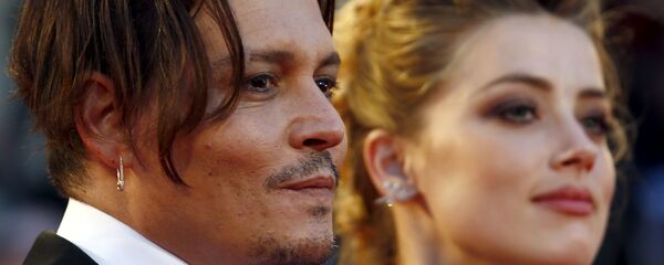 الممثل الأمريكي جوني ديب مع زوجته السابقة الممثلة الأمريكية آمبر هيرد - سبوتنيك عربي