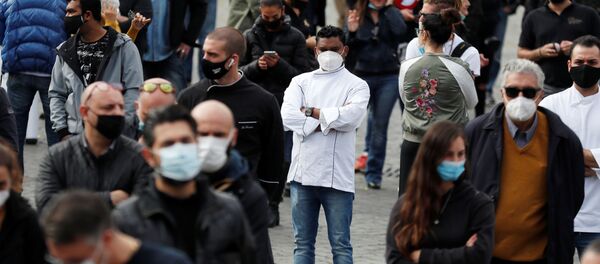 احتجاجات ضد الاجراءات الاحترازية والقيود المشددة بسبب جائحة كورونا في روما، إيطاليا 2 نوفمبر 2020 - سبوتنيك عربي