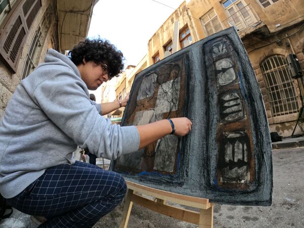فن على الطريق.. رسامو الشوارع يعودون إلى دمشق.. فيديو - سبوتنيك عربي