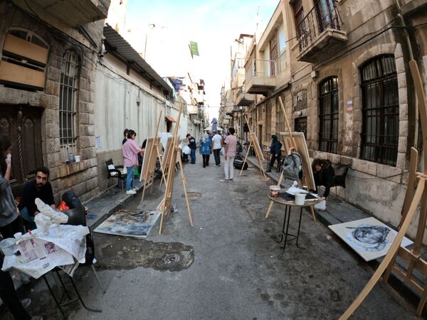 فن على الطريق.. رسامو الشوارع يعودون إلى دمشق.. فيديو - سبوتنيك عربي