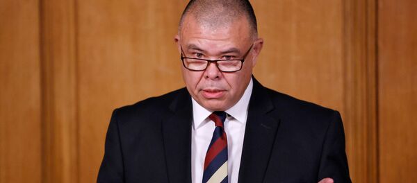 نائب مسؤول كبار الصحة في بريطانيا جوناثان فان تام خلال مؤتمر حول تطور وضع فيروس كورونا المستجد في المملكة المتحدة نائب مسؤول كبار الصحة في بريطانيا جوناثان فان تام خلال مؤتمر حول تطور وضع فيروس كورونا المستجد في المملكة المتحدة - سبوتنيك عربي