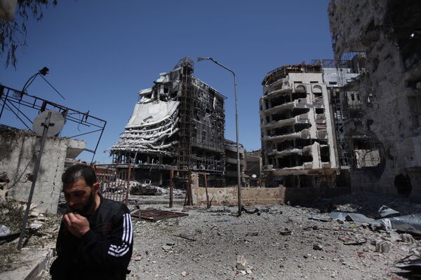 منطقة الخالدية في مدينة حمص السورية التي سيطرت عليها قوات الجيش الحر، سوريا 22 أبريل 2012 - سبوتنيك عربي