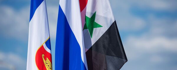 العلم الروسي والسوري - سبوتنيك عربي