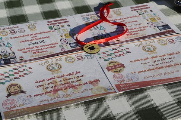 3 أشقاء سوريين يحصدون المركز الأول في البطولة العربية للـالسوروبان... فيديو وصور 3 أشقاء سوريين يحصدون المركز الأول في البطولة العربية للـالسوروبان... فيديو وصور - سبوتنيك عربي