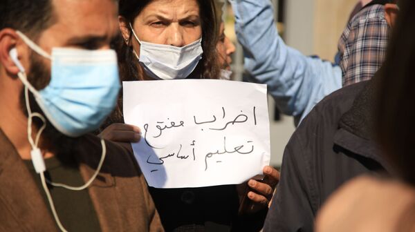 لن نتراجع عن إضرابنا... اعتصام للأساتذة المتعاقدين بالمدارس الرسمية اللبنانية... فيديو لن نتراجع عن إضرابنا... اعتصام للأساتذة المتعاقدين بالمدارس الرسمية اللبنانية... فيديو - سبوتنيك عربي