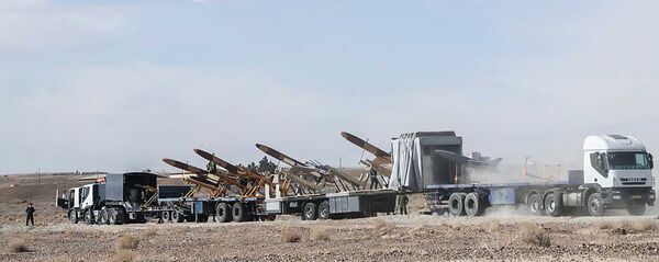 صواريخ إيرانية خلال مناورات الحرس الثوري الإيراني - سبوتنيك عربي