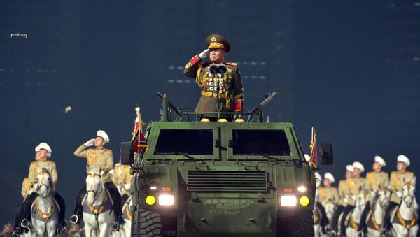 العرض العسكري بمناسبة المؤتمر الثامن لحزب العمال الكوري في بيونغ يانغ، كوريا الشمالية  14 يناير 2021 - سبوتنيك عربي