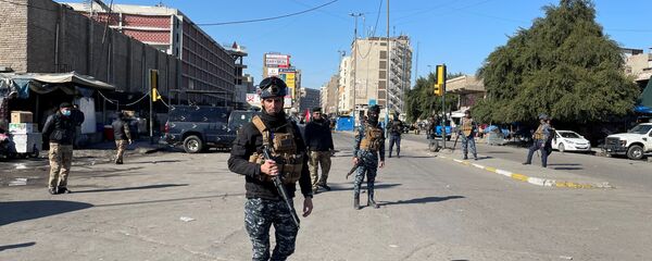 قوات الأمن العراقية في موقع الهجوم الانتحاري في بغداد - سبوتنيك عربي