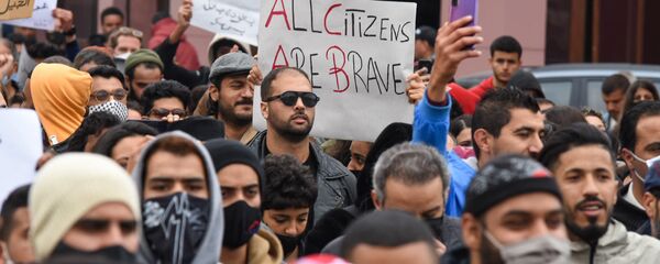 مسيرة بشارع الحبيب بورقيبة في تونس مسيرة بشارع الحبيب بورقيبة في تونس - سبوتنيك عربي