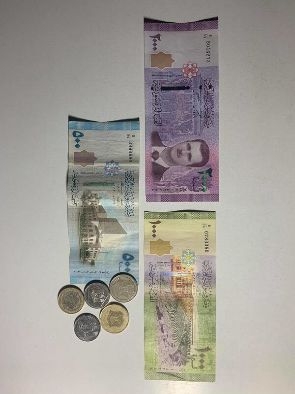 ورقة نقدية تثير الجدل في سوريا.. لماذا؟ ما أثرها على الاقتصادي السوري والتداول المالي؟ - سبوتنيك عربي