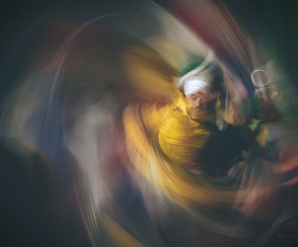  صورة بعنوان الراقص المولوي (الرقص الصوفي)، للمصور عبد الحميد فوزي طاحون، الفائزة في ترشيحات الجوائز الوطنية (مصر) من مسابقة جوائز سوني العالمية للتصوير الفوتوغرافي لعام 2021 - سبوتنيك عربي