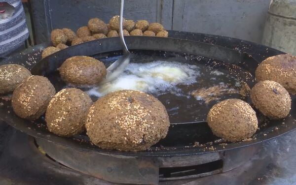 سمير الشخشير صاحب أقدم محل فلافل في مدينة نابلس، الضفة الغربية، فلسطين 19 فبراير 2021 - سبوتنيك عربي