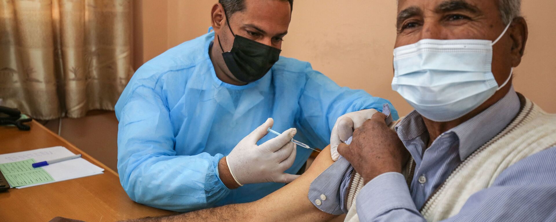 التطعيم بلقاح سبوتنيك V الروسي ضد فيروس كورونا (كوفيد-19)، مدينة غزة، قطاع غزة، فلسطين، 3 مارس 2021 - سبوتنيك عربي, 1920, 24.03.2021