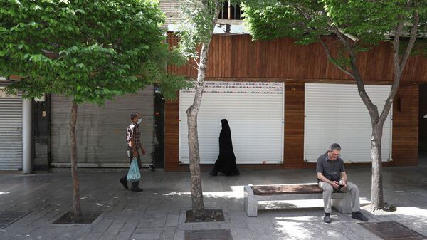 تشديد التدابير الوقائية والاجراءات الاحترازية بسبب فيروس كورونا في طهعران، إيران 10 أبريل 2021 - سبوتنيك عربي