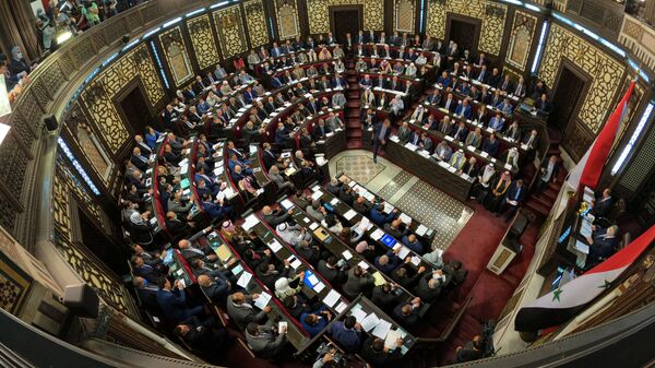 جلسة استثنائية عقدها مجلس الشعب السوري، إيذانا بإطلاق منافسات الانتخابات الرئاسية - سبوتنيك عربي