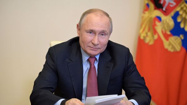 الرئيس الروسي فلاديمير بوتين خلال اجتماع افتراضي مع ممثلي مجتمع الأعمال الفرنسي، في مقره نوفور أوغاروفو، ضواحي موسكو، روسيا 29 أبريل 2021 - سبوتنيك عربي