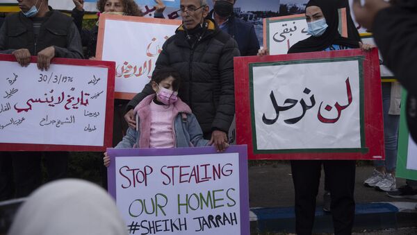 مواجهات بين أهالي حي الشيخ جراح وقوات الشرطة الإسرائيلية والمستوطنين، القدس الشرقية، فلسطين، 30 مارس 2021 - سبوتنيك عربي