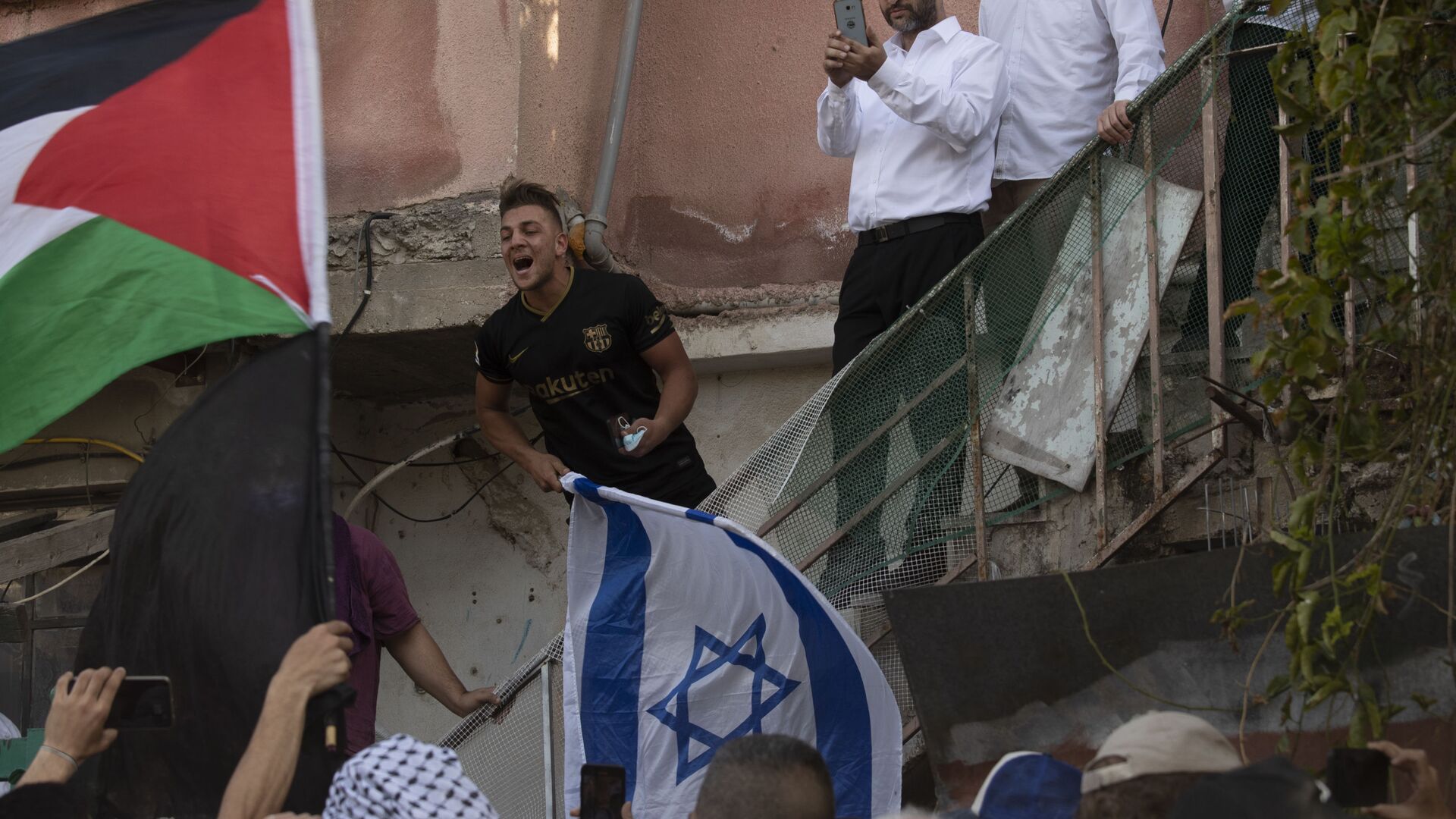 مواجهات بين أهالي حي الشيخ جراح وقوات الشرطة الإسرائيلية والمستوطنين، القدس الشرقية، فلسطين، 16 أبريل 2021 - سبوتنيك عربي, 1920, 06.05.2021