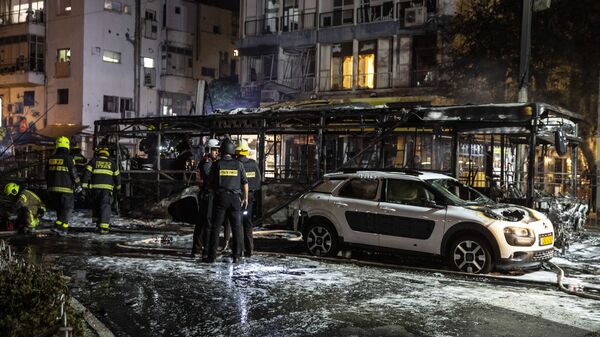 تداعيات قصف المقاومة الفلسطينية على حي حولون، مدينة تل أبيب، إسرائيل، 11-12 مايو 2021 - سبوتنيك عربي