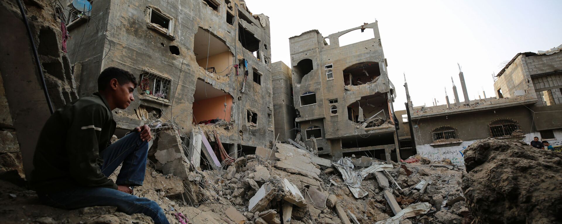 الفلسطينيون يعودون إلى منازلهم بعد اتفاق وقف النار بين فصائل المقاومة الفلسطينية و إسرائيل، قطاع غزة، مايو 2021 - سبوتنيك عربي, 1920, 26.01.2026