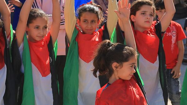 مبادرة ترفيهية لرسم الابتسامة على وجوه أطفال قطاع غزة والتخفيف من آثار الحرب، فلسطين 28 مايو 2021 - سبوتنيك عربي