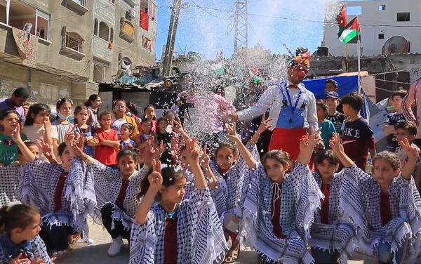 مبادرة ترفيهية لرسم الابتسامة على وجوه أطفال قطاع غزة والتخفيف من آثار الحرب، فلسطين 28 مايو 2021 - سبوتنيك عربي