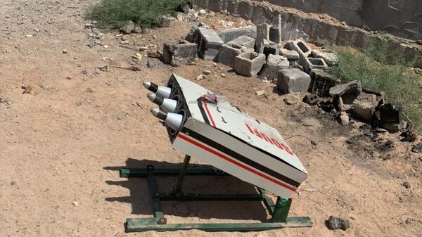 قوات الشرطة الاتحادية العراقية تضبط منصة لإطلاق صواريخ طراز كاتيوشا معدة للإطلاق في جنوب غرب بغداد، العراق 28 مايو 2021 - سبوتنيك عربي